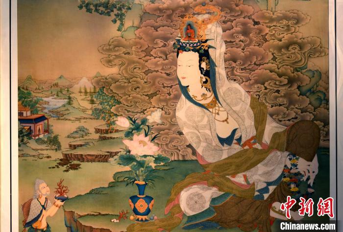 圖為5月16日，展覽中新創(chuàng)唐卡作品《靜息觀音》(局部)。　李林 攝